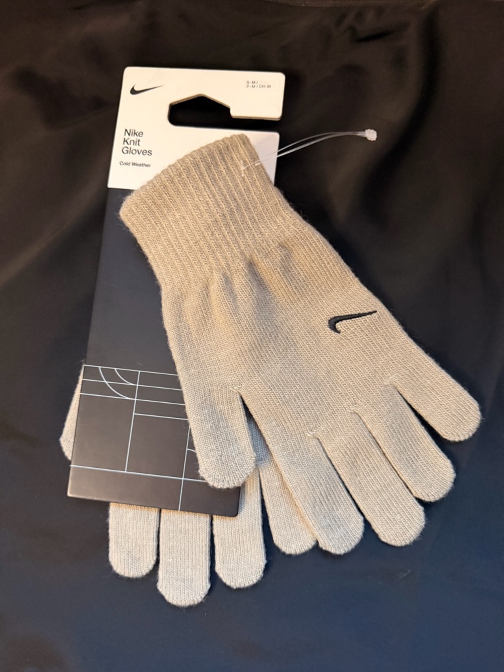 Nike Knit Gloves in Light Beige with Black Swoosh
